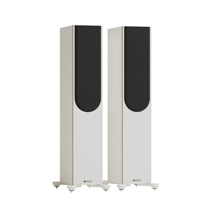 Monitor Audio Bronze 300 7G in White, angled view with grilles