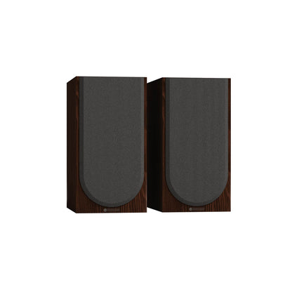 Monitor Audio Silver 100 8G in European Walnut, angled view with grilles